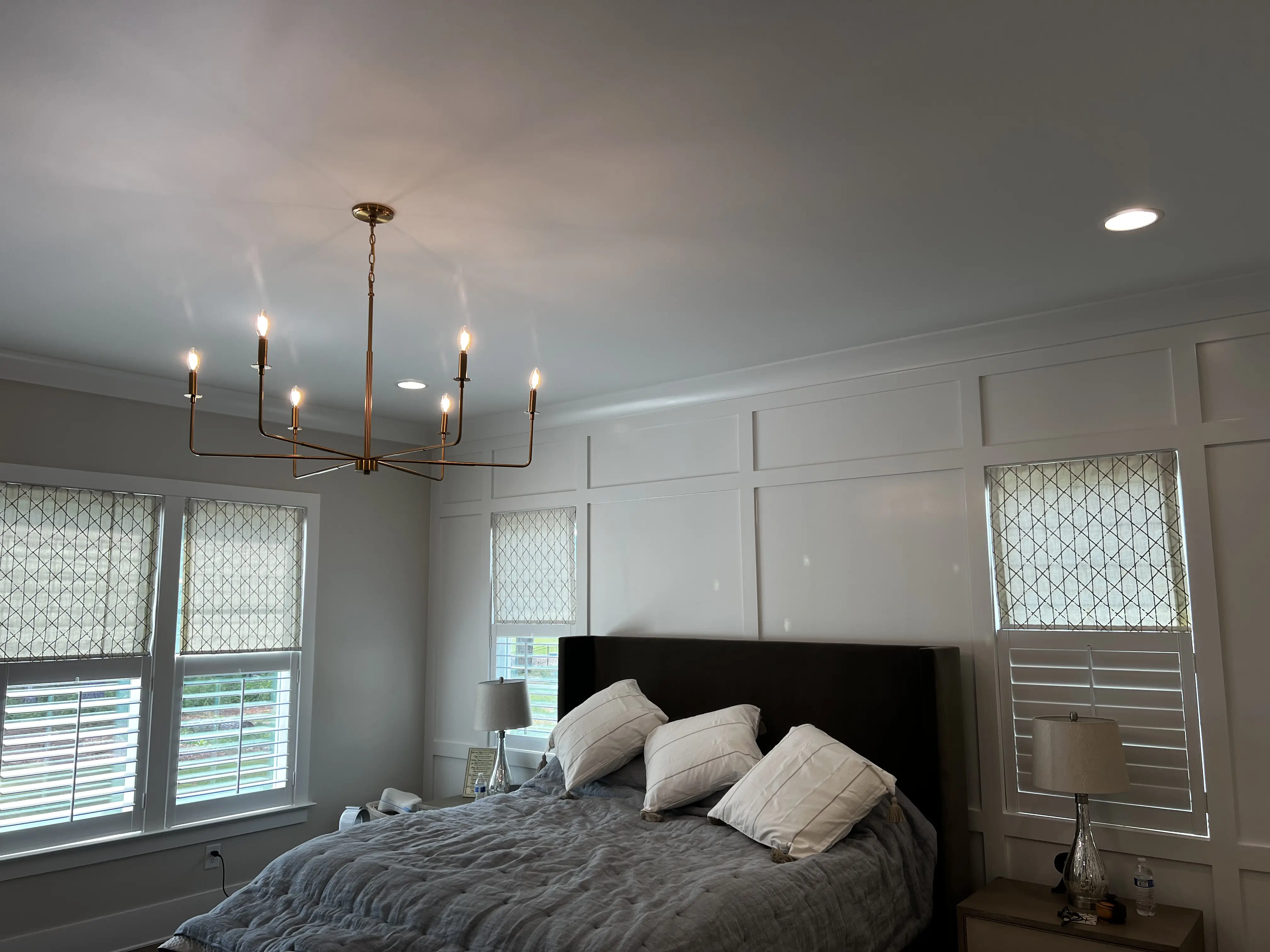 Luxury woven wood Roman shades in a kitchen space